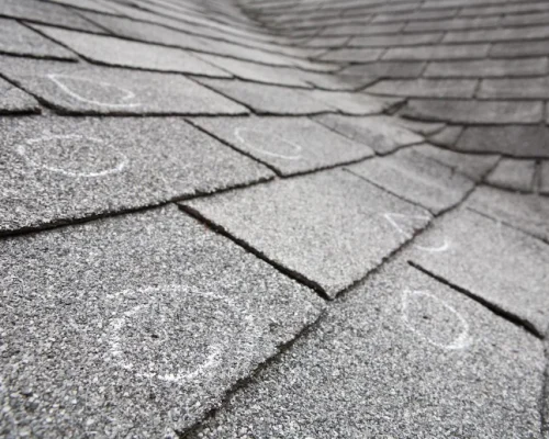 hail-damage-marked-with-chalk-on-roof-1024x683